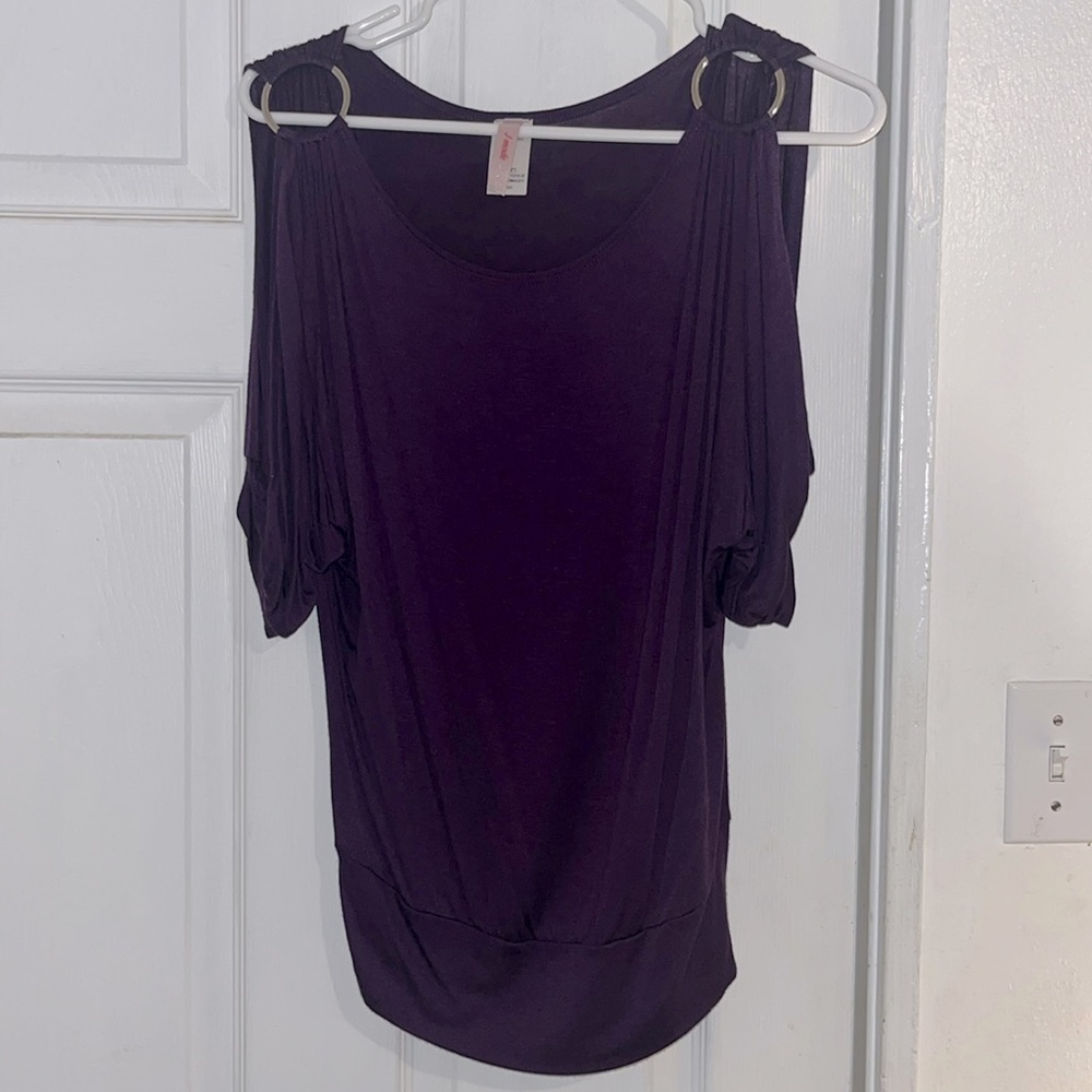 Purple shirt.